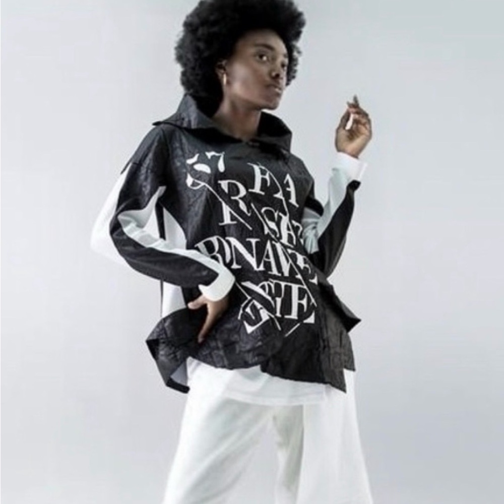 Black and white funnel neck top
